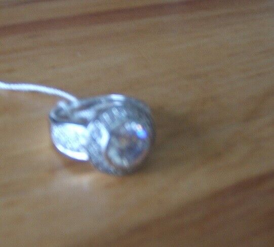 Brand New Rhodium Silver Ring Embedded with Round Shape Cubic Zirconia Size O .5 £79 RRP