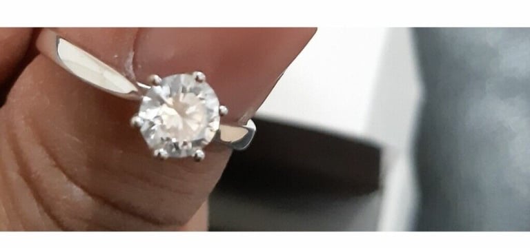 Premier Round Brilliant Trilogy Ring