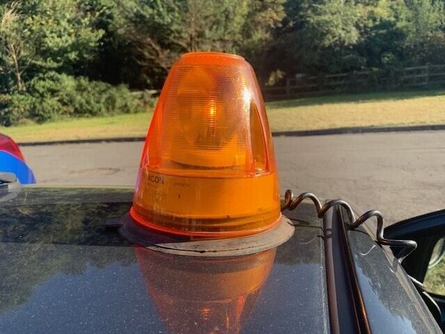 Orange Beacon with Strong Magnetic Base. Free Standing, For use in Breakdown or Emergency Towing.