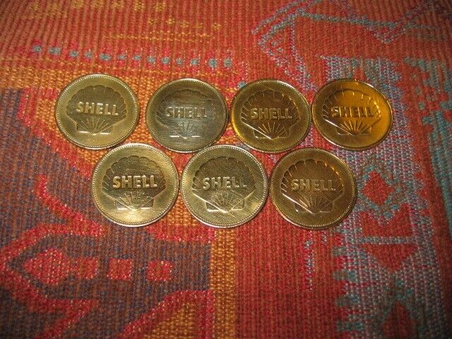Shell 'Man in Flight' commemorative brass coins.