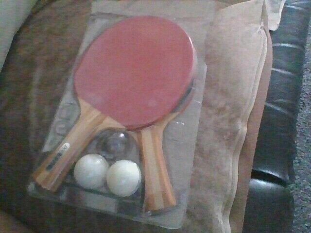 table tennis bats and balls 