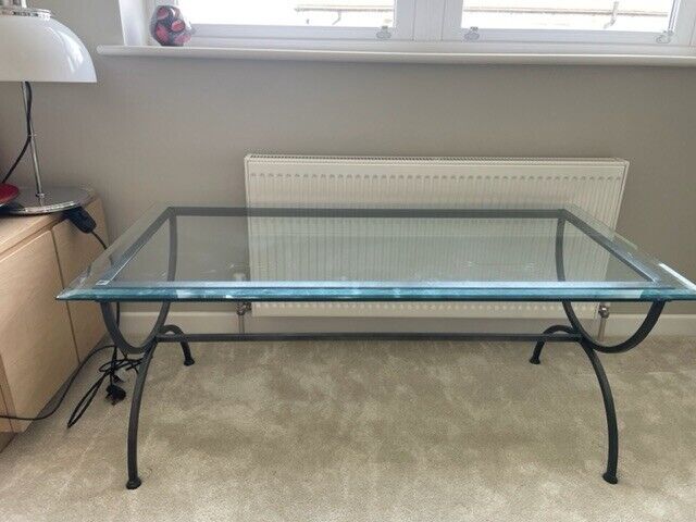 Large glass topped coffee/ occasional table 