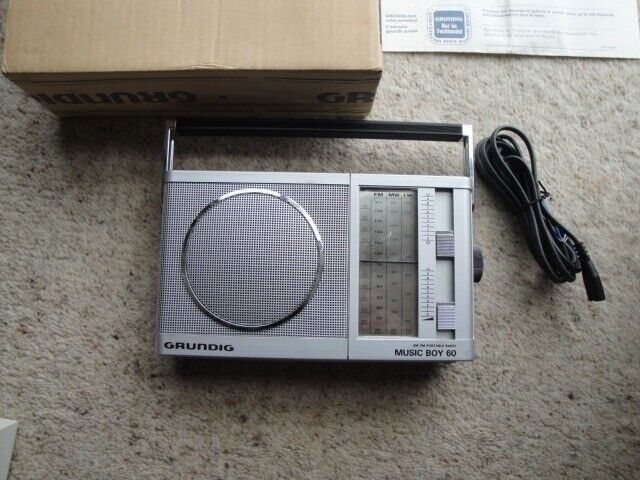 As New Grundig Music-Boy 60L Metallic Portable / Mains Radio. Ref L1306