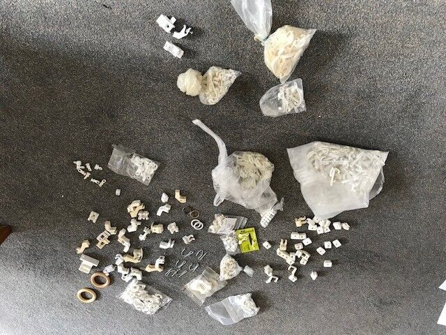 A collection of white curtain tracks and fittings[or separate]