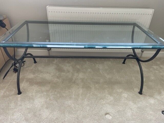 Large glass topped coffee/ occasional table 