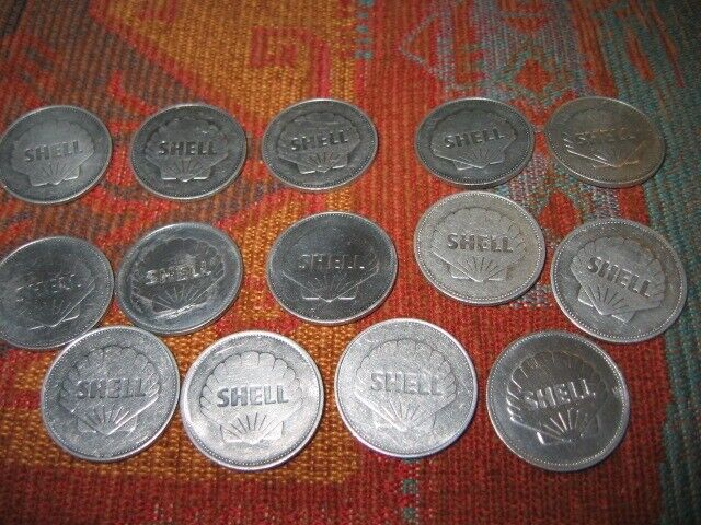 Shell 'Man in Flight' commemorative aluminium coins.