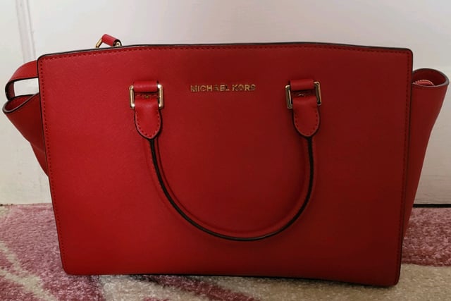 Red michael deals kors wristlet