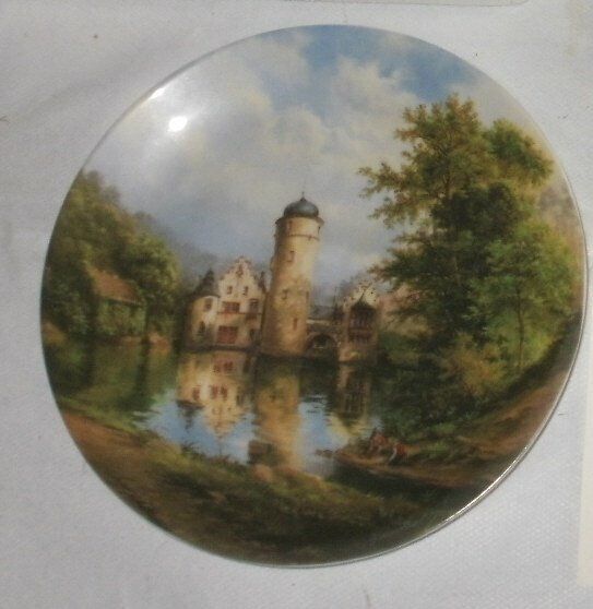 Moated castles by Eleonore  Guinther. Collectors Plates with the artist signature on the plate
