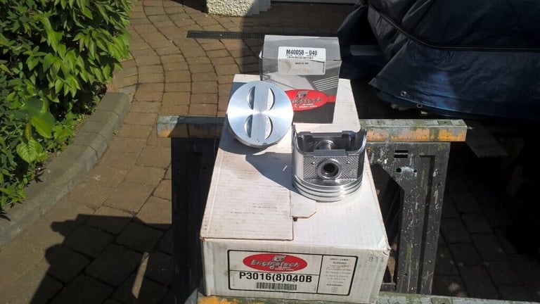 327 SBC NEW Pistons + 0.040 & NEW Molly Rings.   