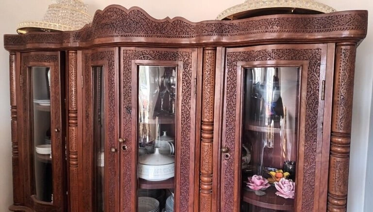 A BEAUTIFUL CARVED SIDEBOARD