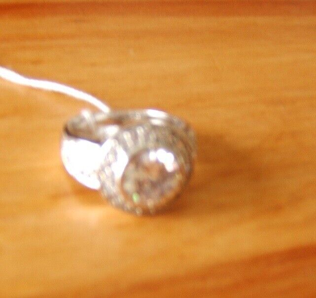 Brand New Rhodium Silver Ring Embedded with Round Shape Cubic Zirconia Size O .5 £79 RRP