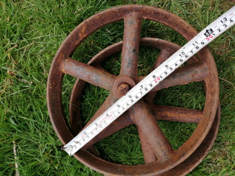image for Pair of cast iron wheels
