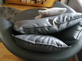 Grey leather swivel cuddle chair