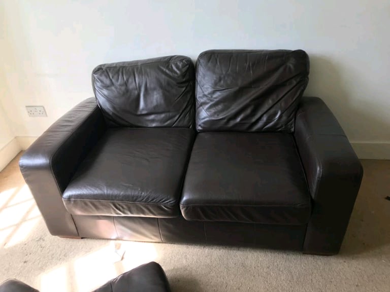 1 leather ,2 seater Brown. couche From Next