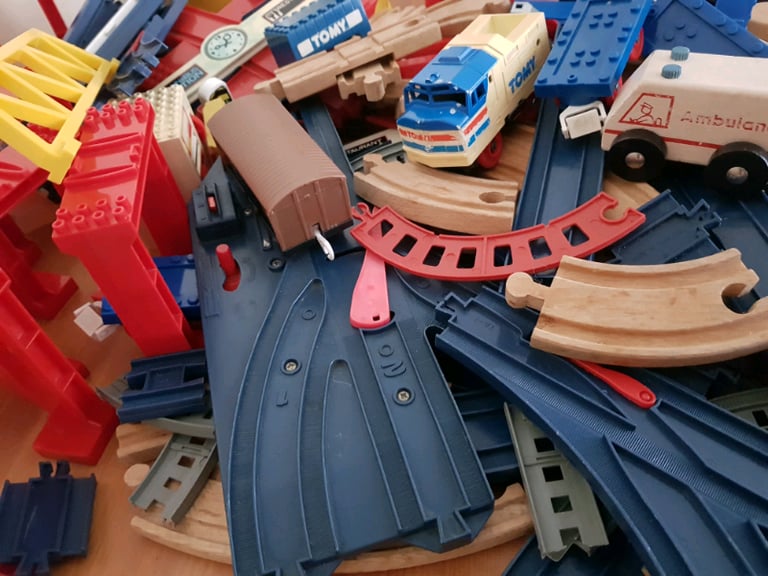 A bagful of railway tracks + locomotive, wagons, etc 