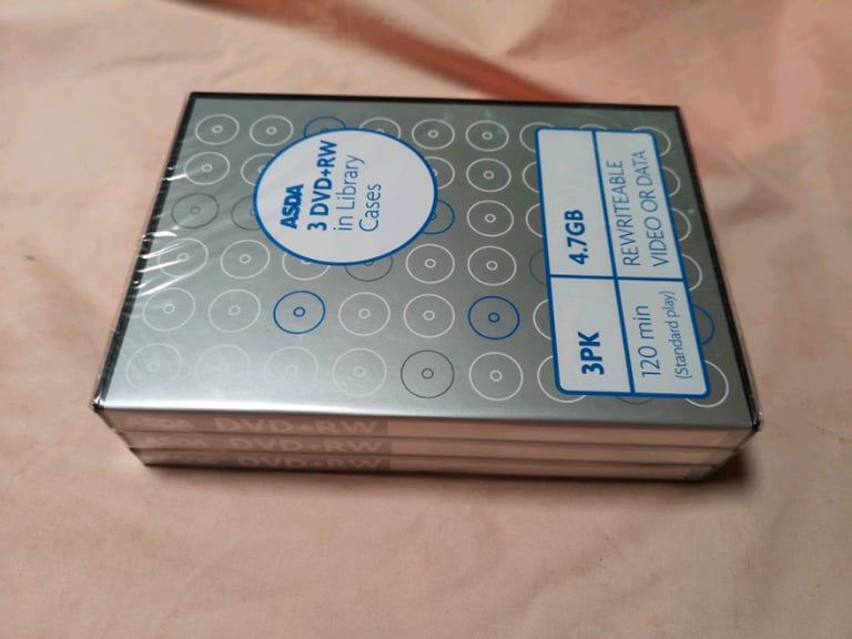 3 DVD-RW with cases (brand new). 2 CD-R with cases. 