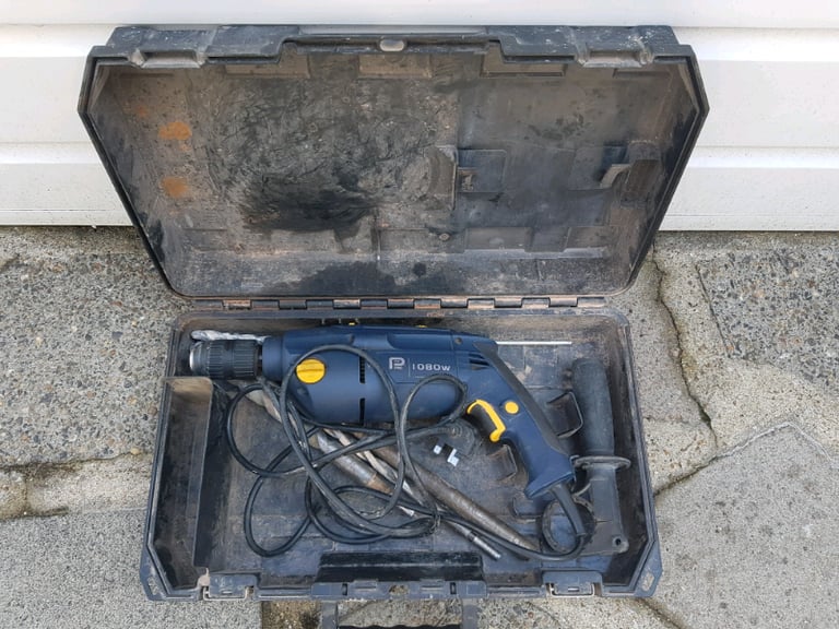 CLM 1080HD hammer drill with 13 and 22mm masonry bits and hard case.