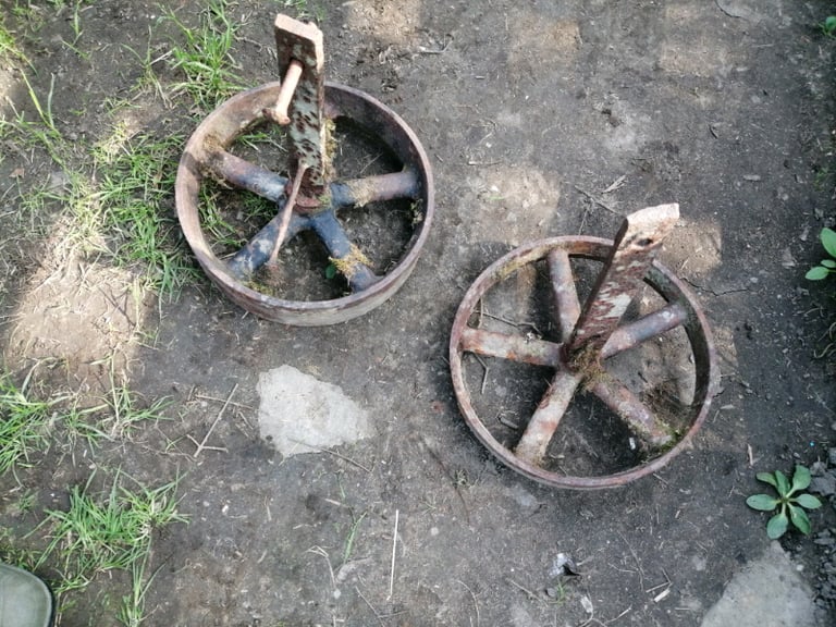 Pair of cast iron wheels