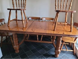 6-seater extendable wooden table and chairs 