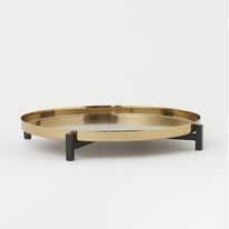 Round metal tray with a stand