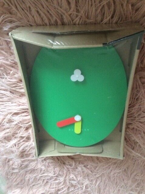 Very cute grass green  “Bill” wall clock, quartz movement, battery operated in original packaging