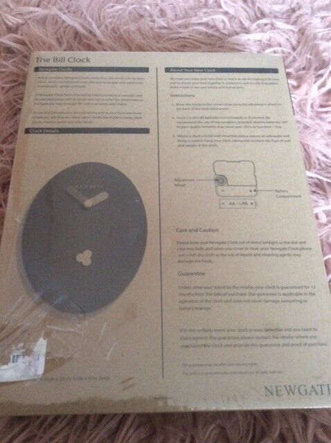 Very cute grass green  “Bill” wall clock, quartz movement, battery operated in original packaging