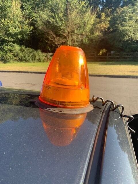 Orange Beacon with Strong Magnetic Base. Free Standing, For use in Breakdown or Emergency Towing.