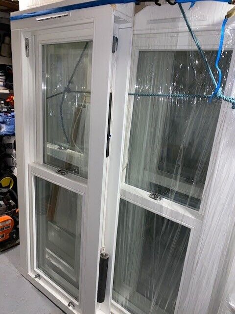 Traditional wooden sash window with key