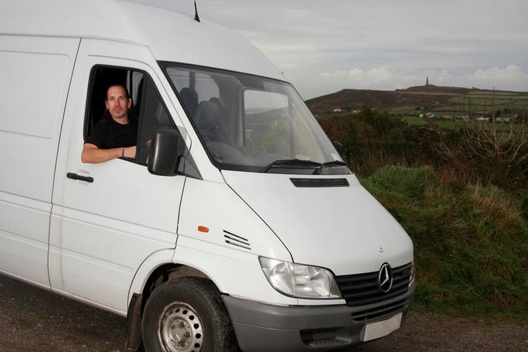 AAA Man with van