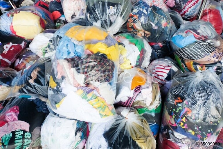 image for Wholesale Second Hand Clothes Adults or Kids A or B Grade From £1 KG. Delivery Available