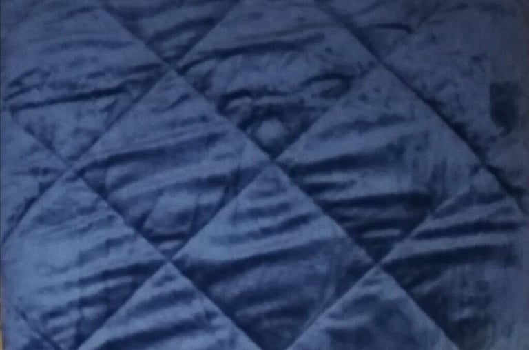 Weighted blanket by Kuddly