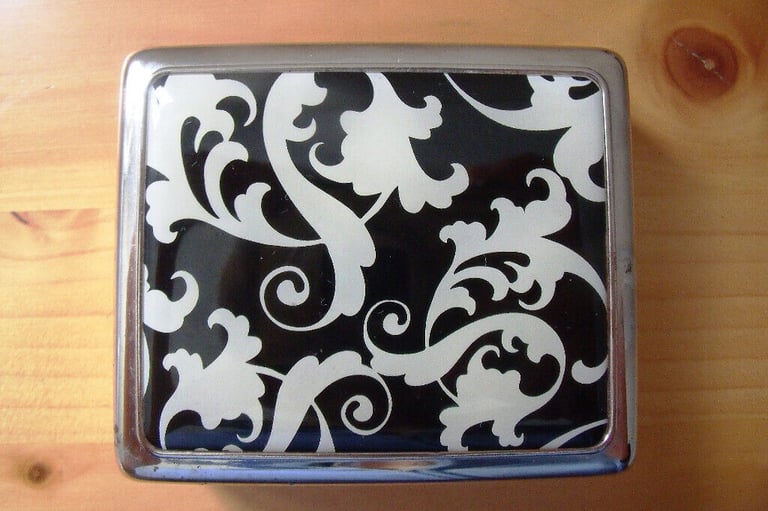 image for 	Un-used lens box with integral mirror, lens holder, bottles and tweezers.