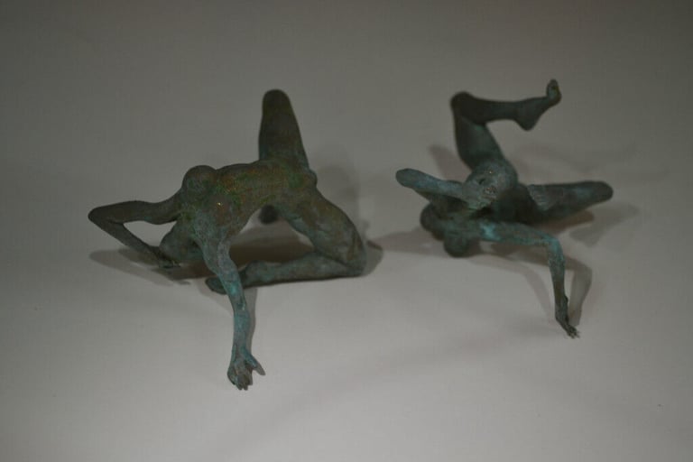 Faux bronze naked/ wrestling ladies.....