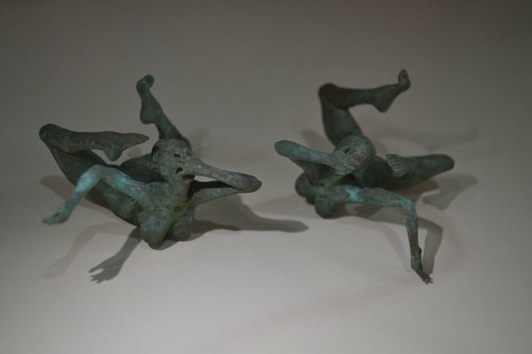 Faux bronze naked/ wrestling ladies.....