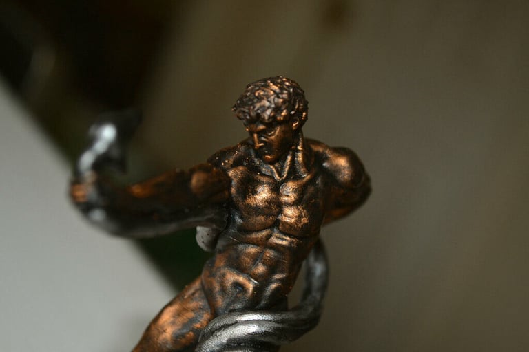 Naked athlete wrestling Python figurine