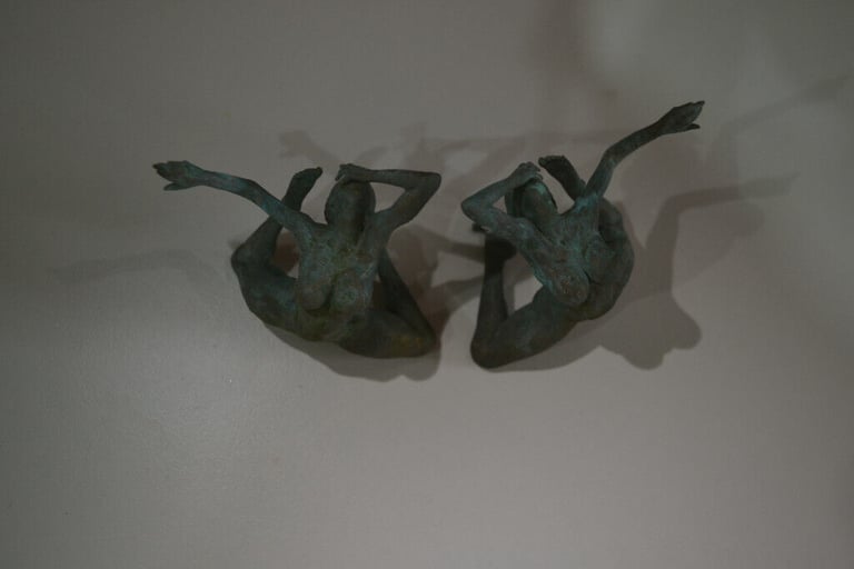 Faux bronze naked/ wrestling ladies.....