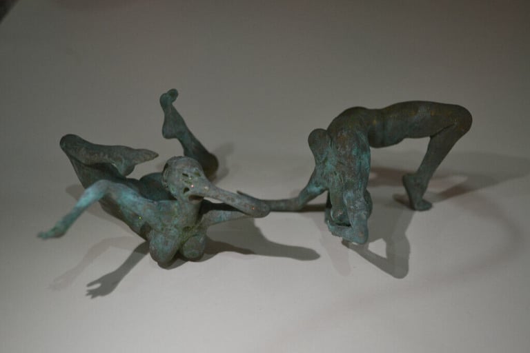 Faux bronze naked/ wrestling ladies.....
