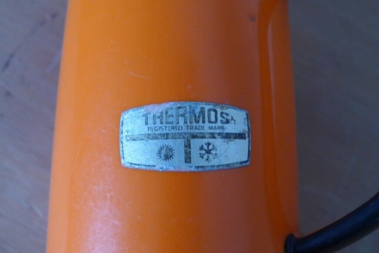 Kitchenalia: Vintage 1950s/1960s Jug-shaped Thermos Flask in Orange and black.