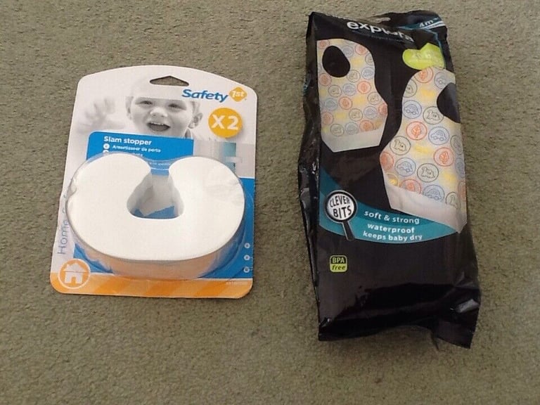 Two of slam stopper in one pack(£1)disposable waterproof bibs to keep baby dry (£1)