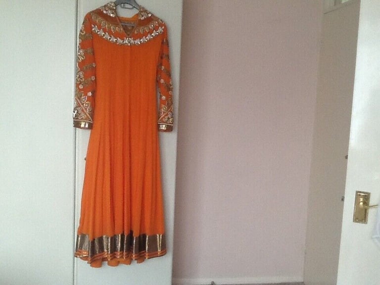 image for Beautiful  heavy embroidered ankle length party wear dress in chiffon material hardly worn 125