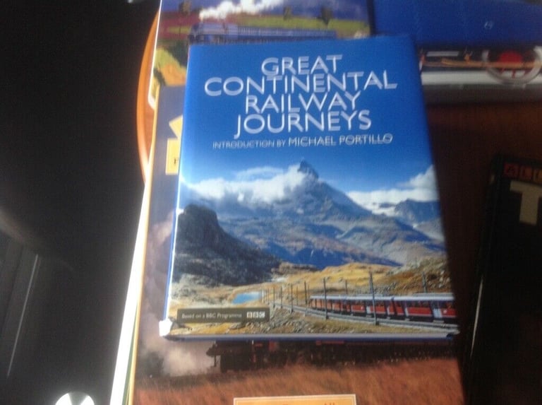 6 Large train books  £10
