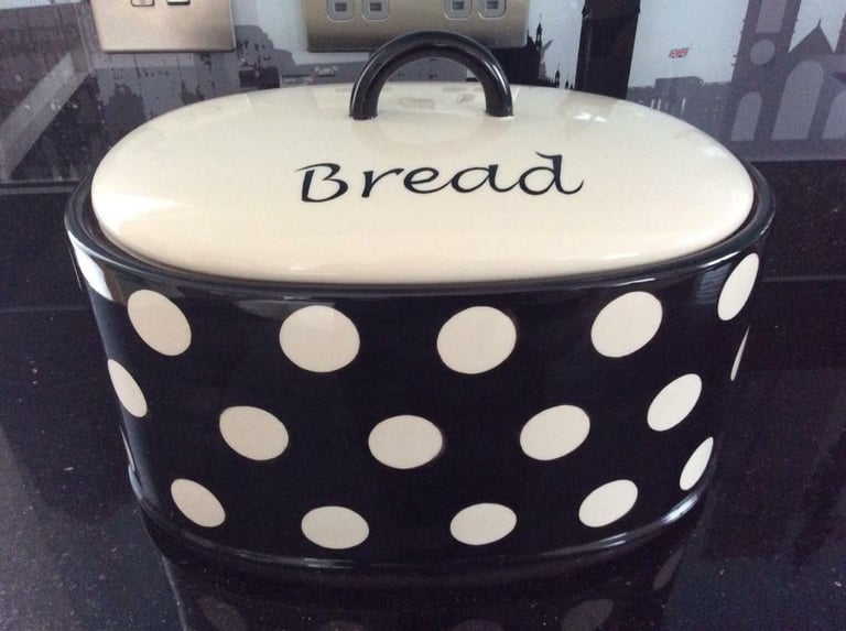 Bread bin with Price and Kensington marked on the base.