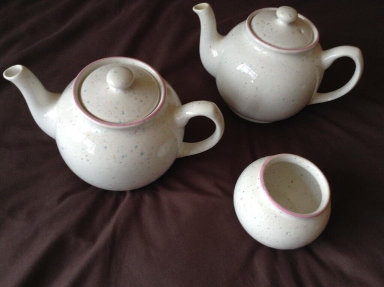Tea pots,  white with small multi coloured fleck pattern and pink rim