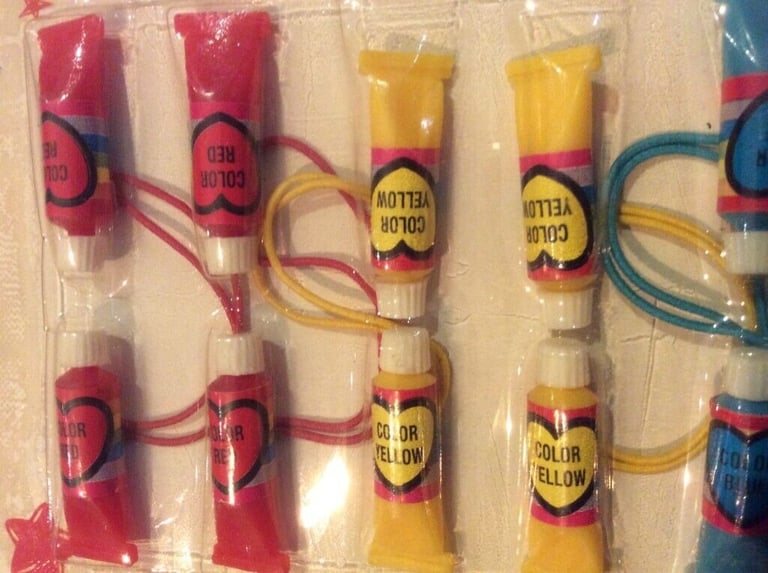 Vintage 1980s cute pony tails/novelty hair ties: shaped as paint tubes; original packaging-unopened