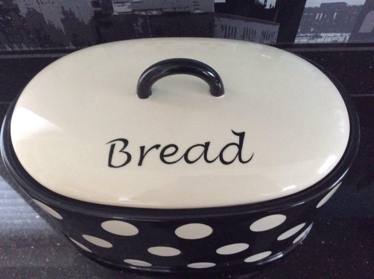 Bread bin with Price and Kensington marked on the base.