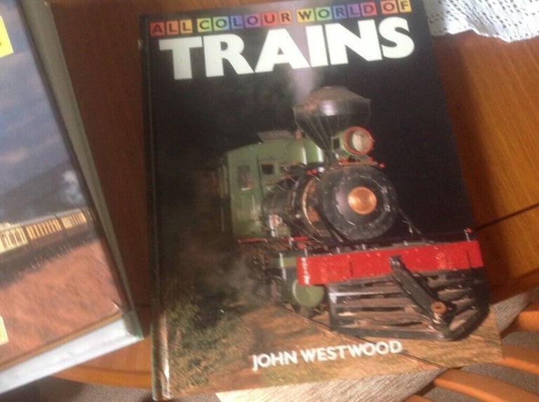 6 Large train books  £10