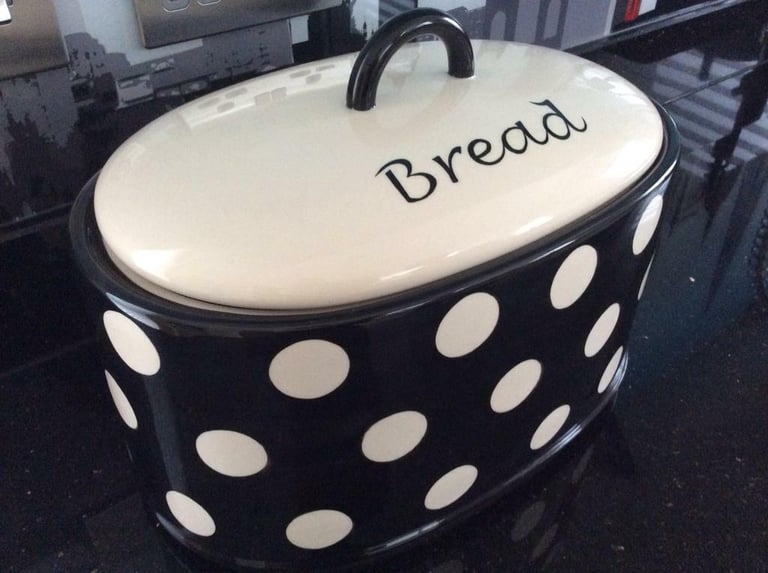 Bread bin with Price and Kensington marked on the base.