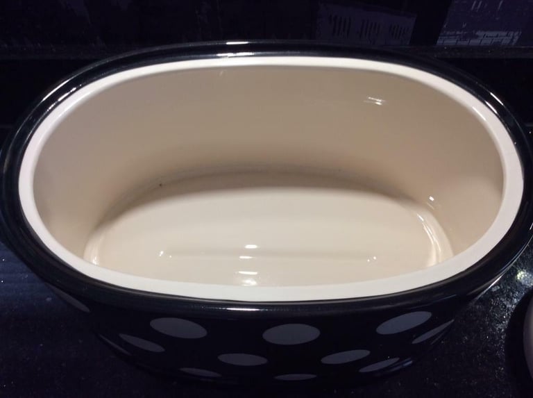 Bread bin with Price and Kensington marked on the base.