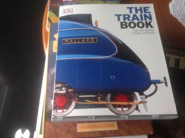 6 Large train books  £10