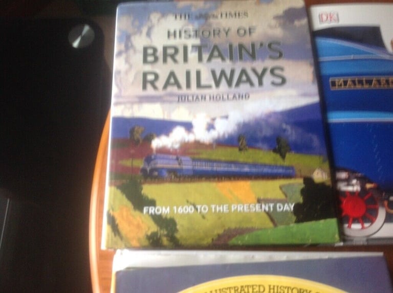 6 Large train books  £10